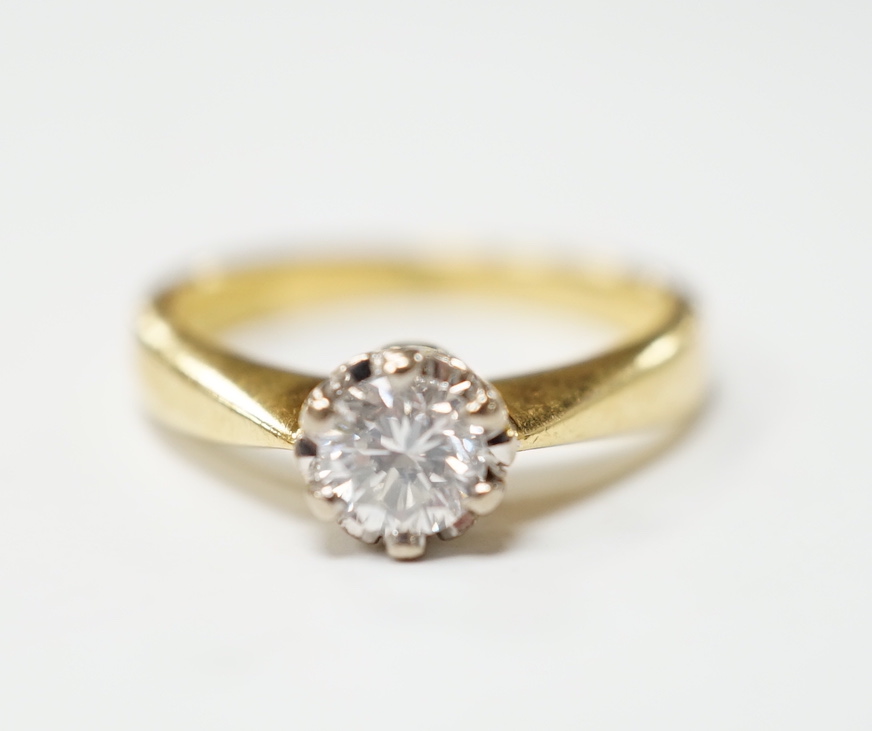 A modern 18ct gold and solitaire diamond set ring, the stone weighing 0.33ct, size I, gross weight 4.2 grams.